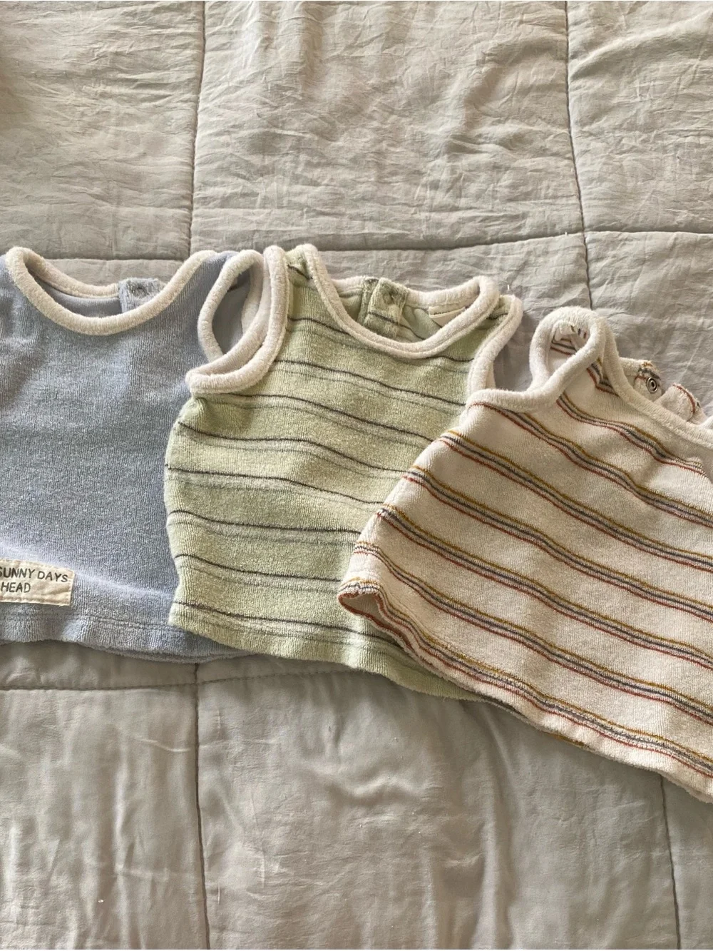 Calvin Klein Navy & White Striped Baby Onesie with Mixed Neutral Baby Clothing